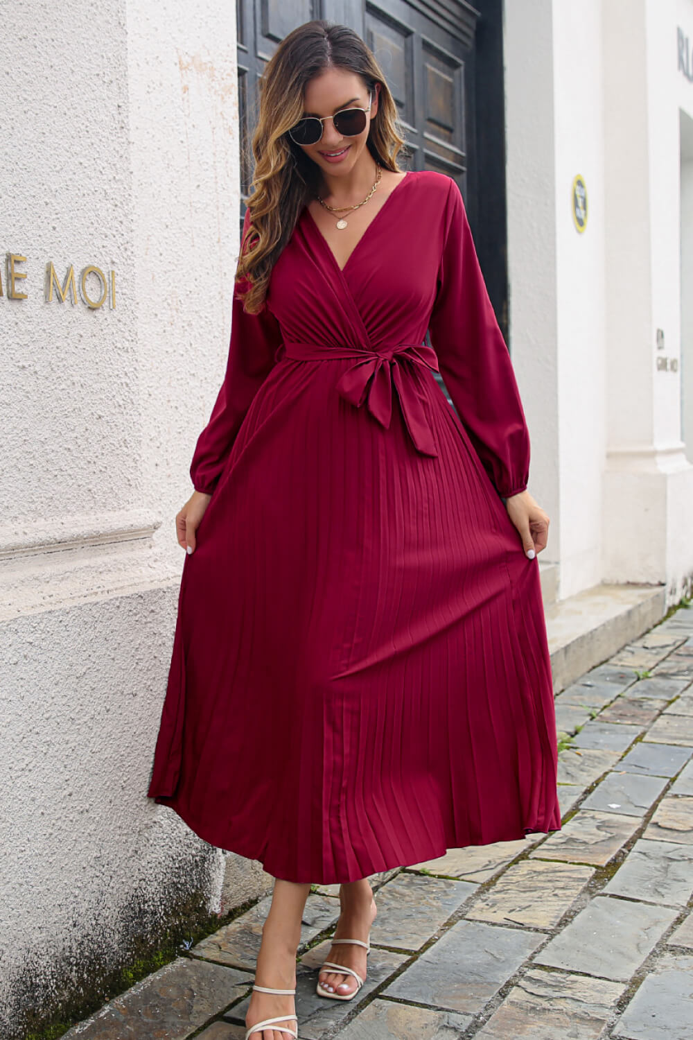 pleated long sleeve surplice maxi dress