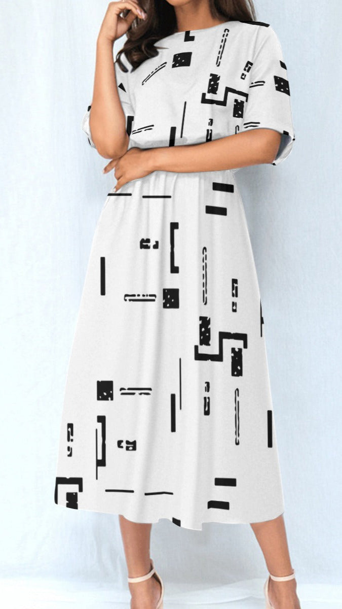 white dress with black geometric patterns