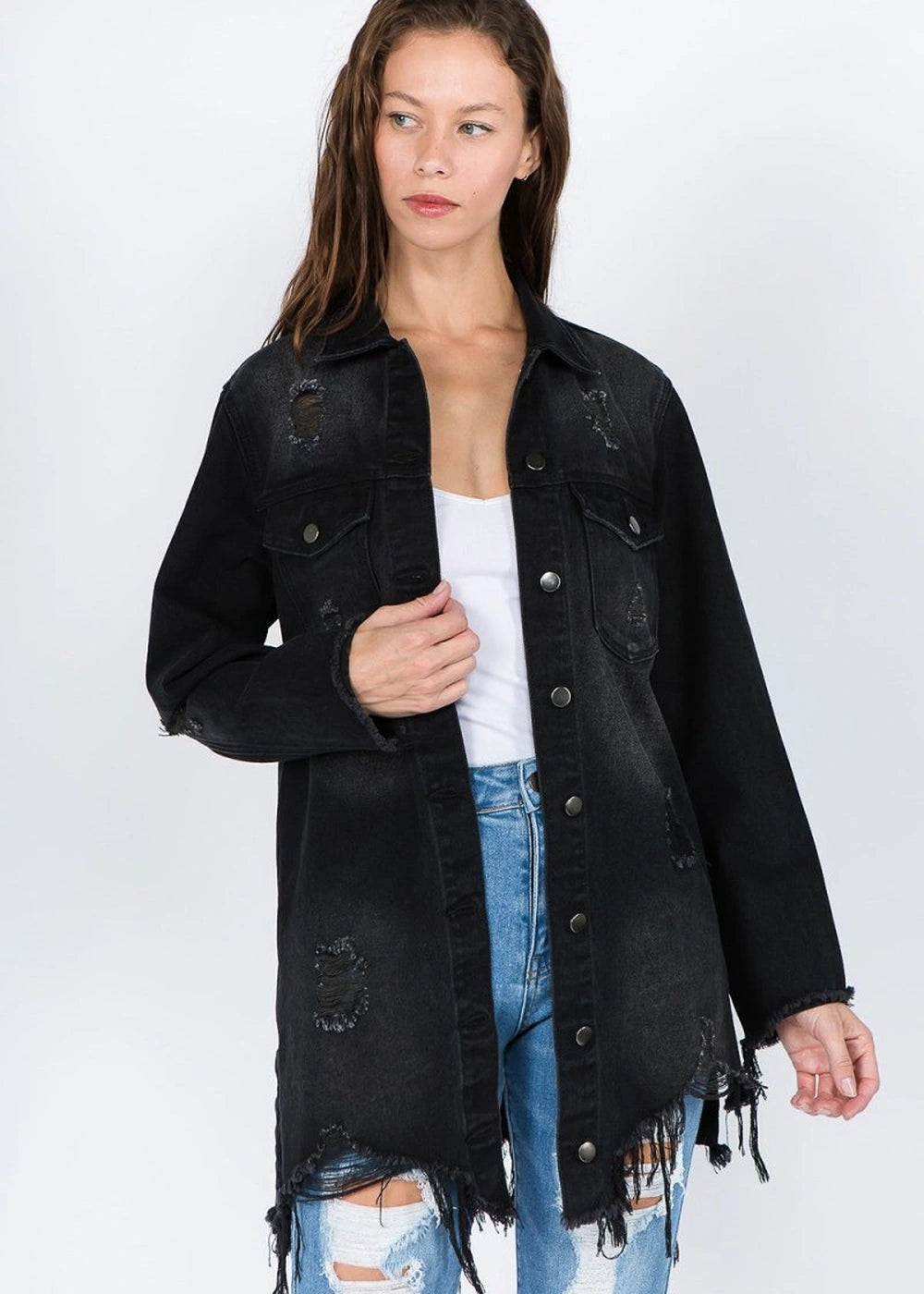 Distressed denim jacket with frayed hem