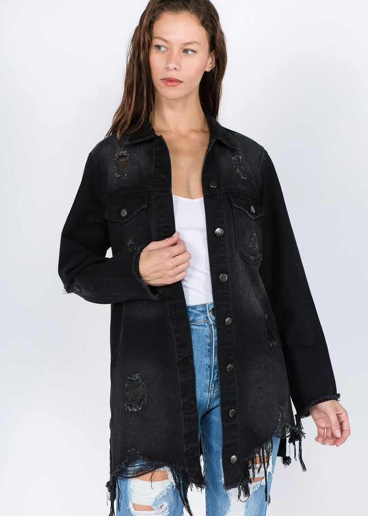 Distressed denim jacket with frayed hem