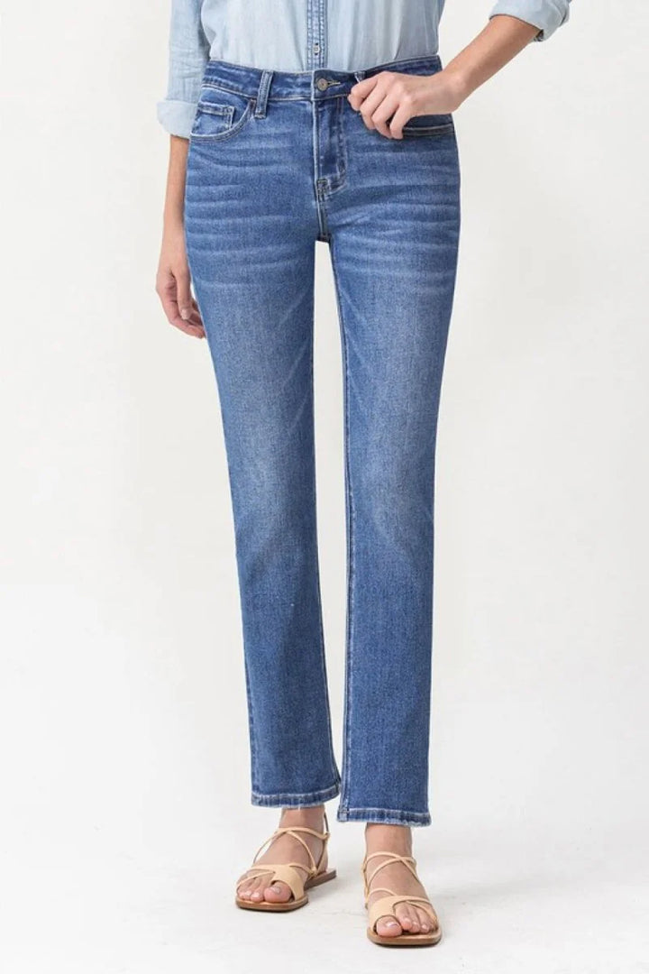 Medium wash midrise slim ankle straight jeans