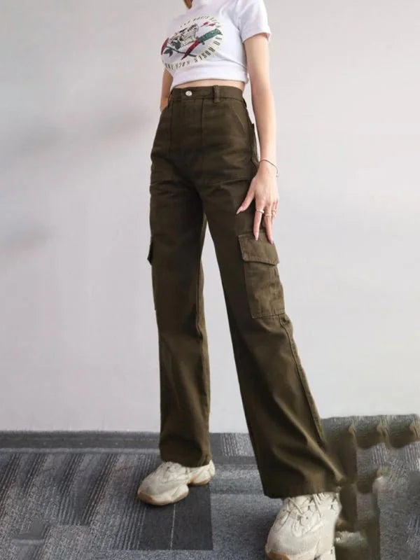 Relaxed fit, olive green cargo pants with large side pockets on model.