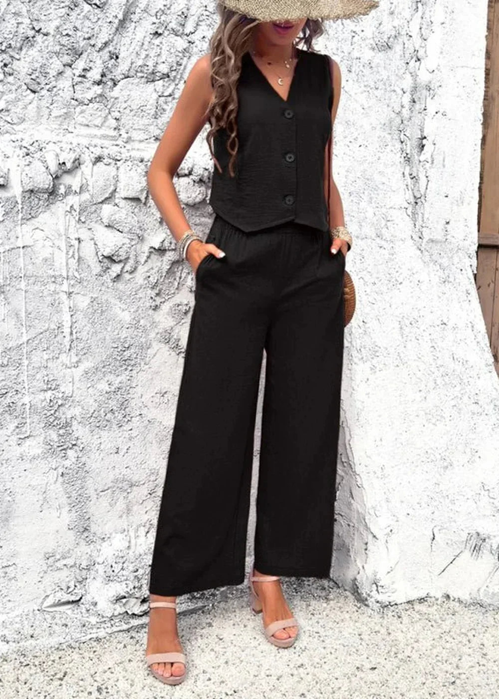 Black linen blend cropped vest and wide-leg pants set on a model.