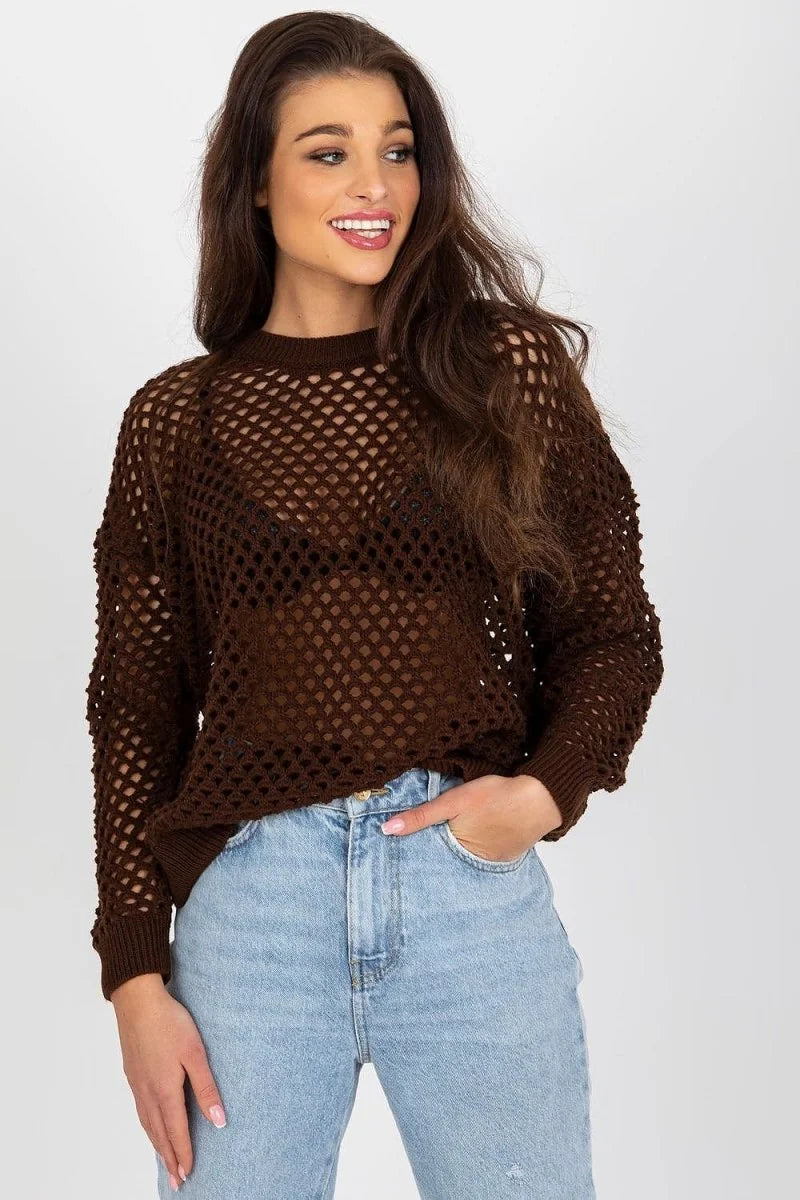 Brown crochet knit sweater with a loose fit, worn by a model with light blue jeans.