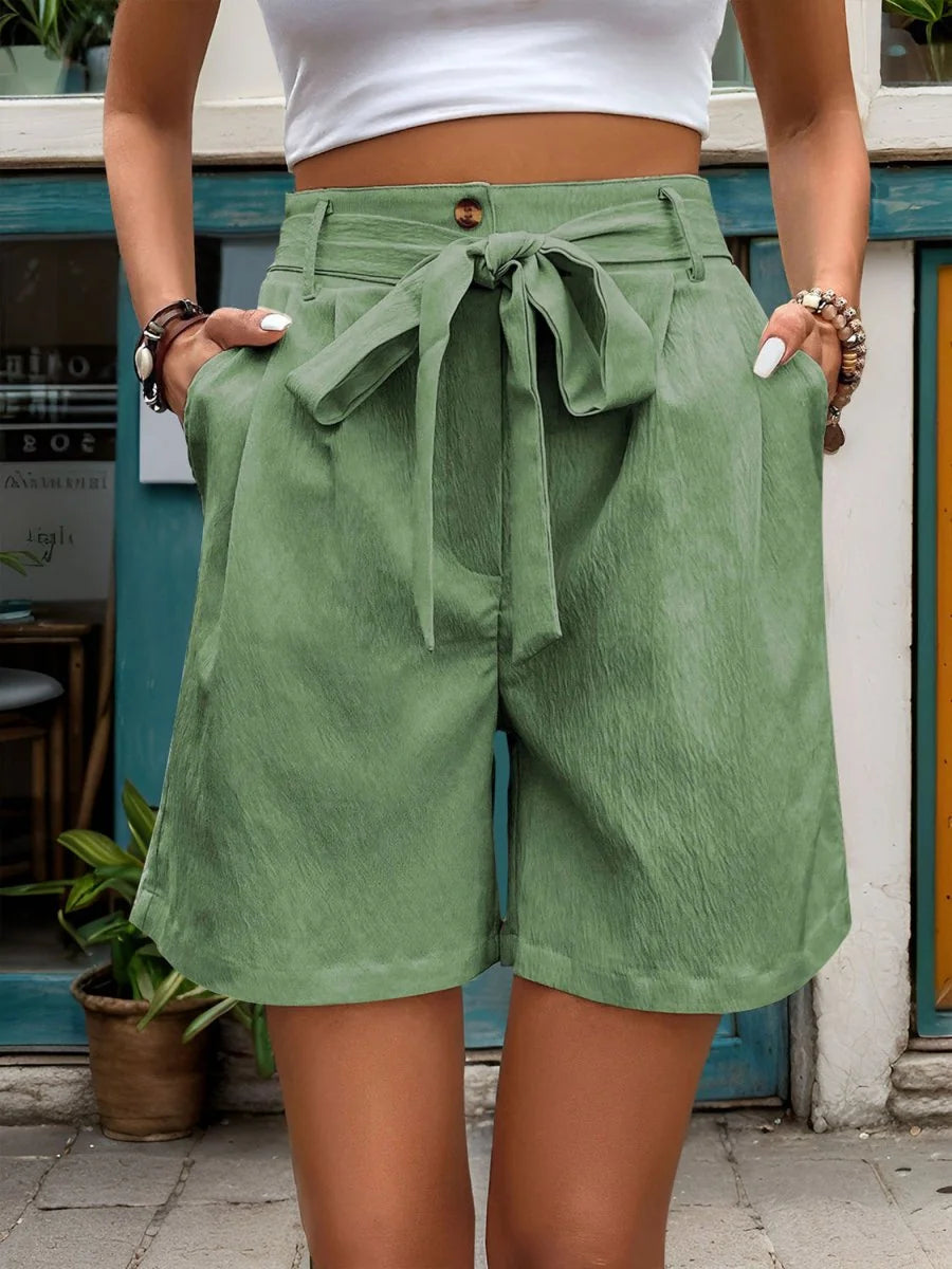in 100% polyester, showing regular fit and tie detail.
