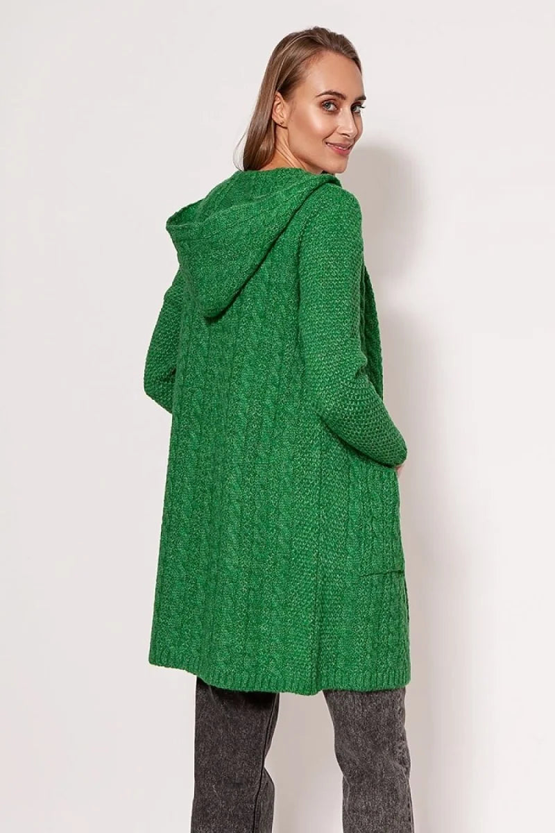 Green cable-knit hooded cardigan with pockets, worn by a model from the back.