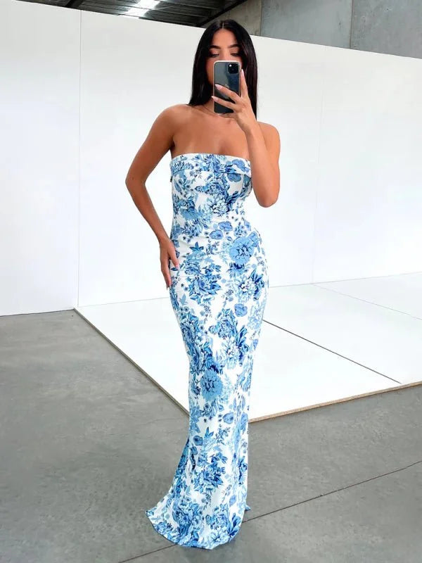Strapless maxi dress with blue floral pattern, fitted silhouette, on a model.