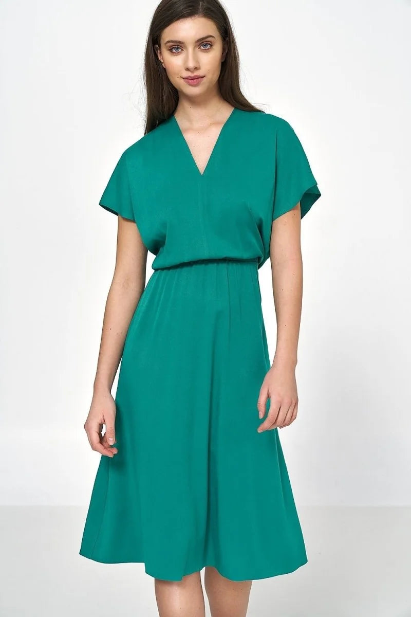 Teal v-neck midi dress with flutter sleeves and elasticated waist on a model.