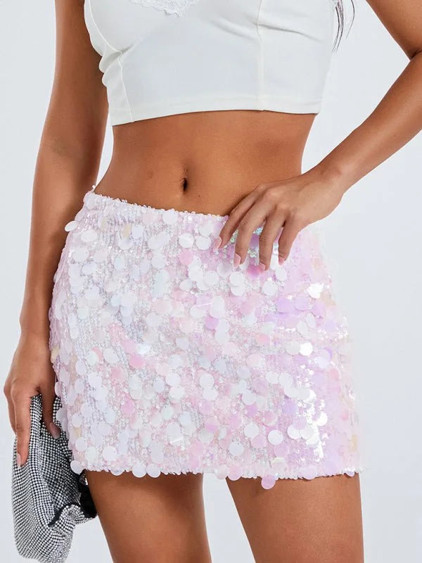 Pink sequined mini skirt with iridescent shine and a scalloped hem.