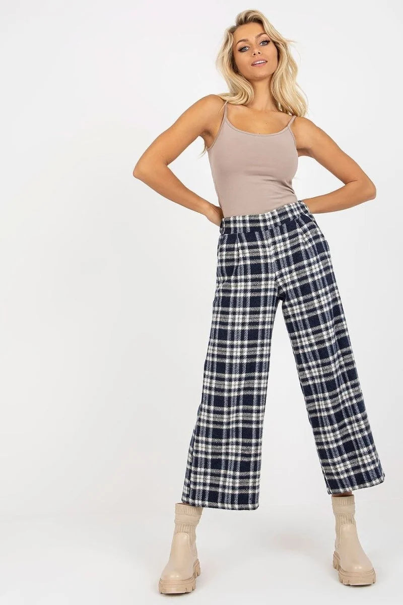 Navy and white checkered wool culottes with a regular fit, shown on a model.