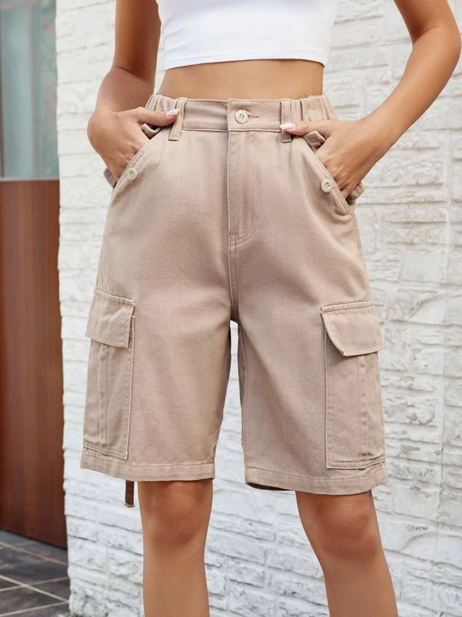 Tan cargo shorts with elastic waist, button closure, and large flap pockets on legs.