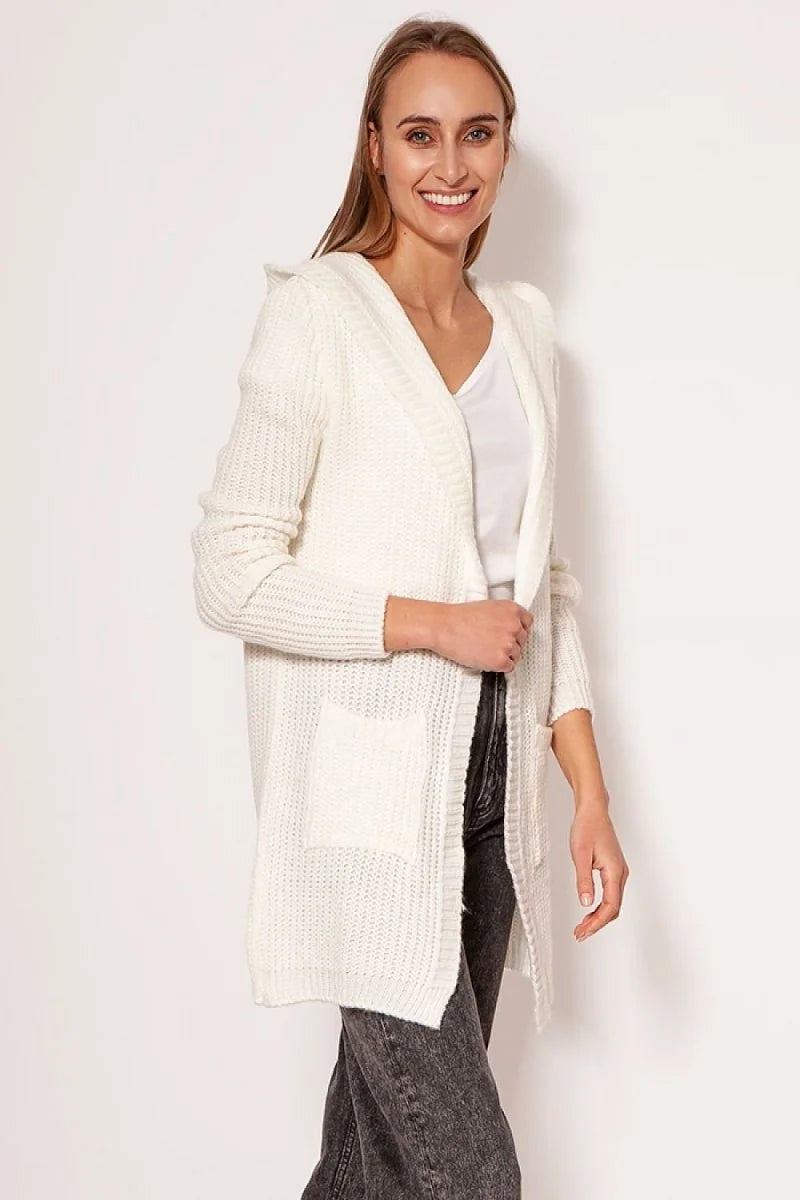 Creamy white knitted hooded cardigan with pockets, on a smiling model.