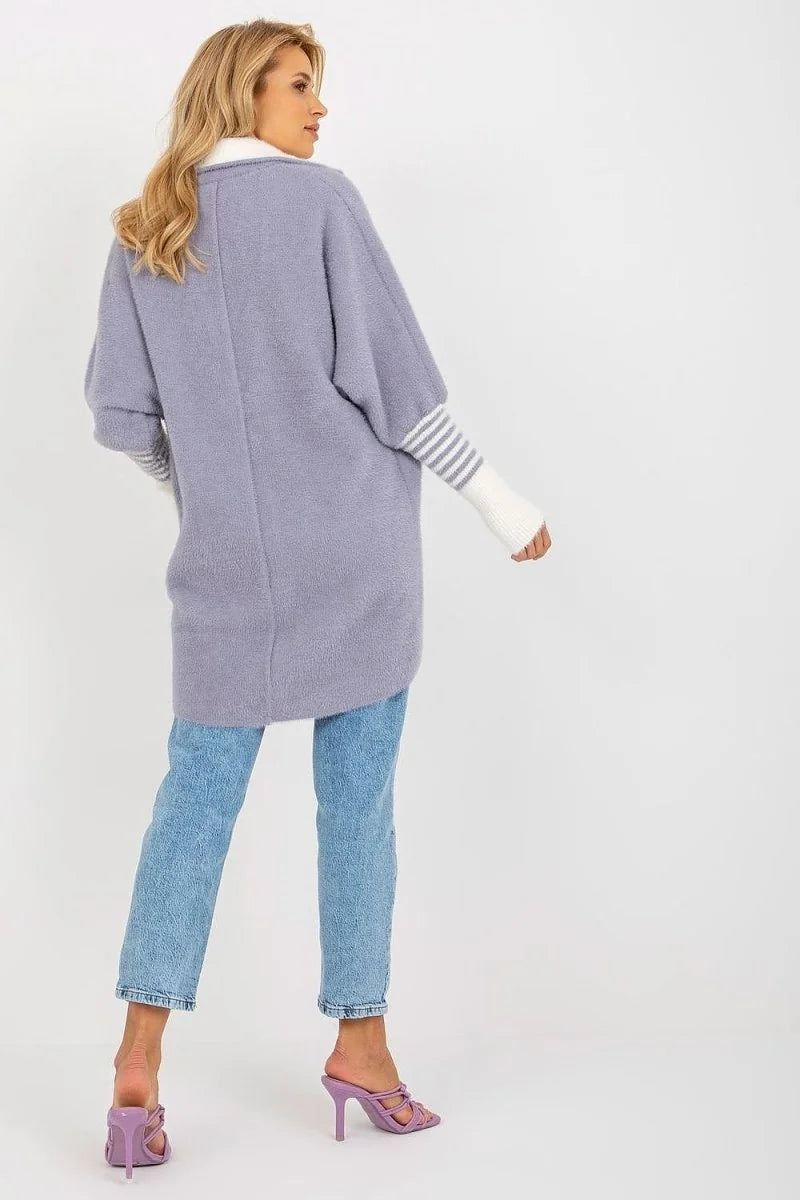 Lavender angora blend sweater with white striped cuffs worn by a model.