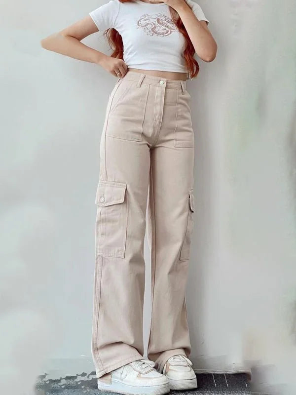 Beige cargo pants with large side pockets, relaxed fit, on model.
