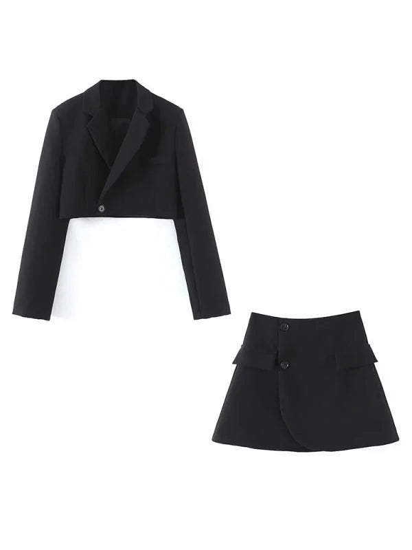 Black cropped blazer and mini skirt with button details against a white background.