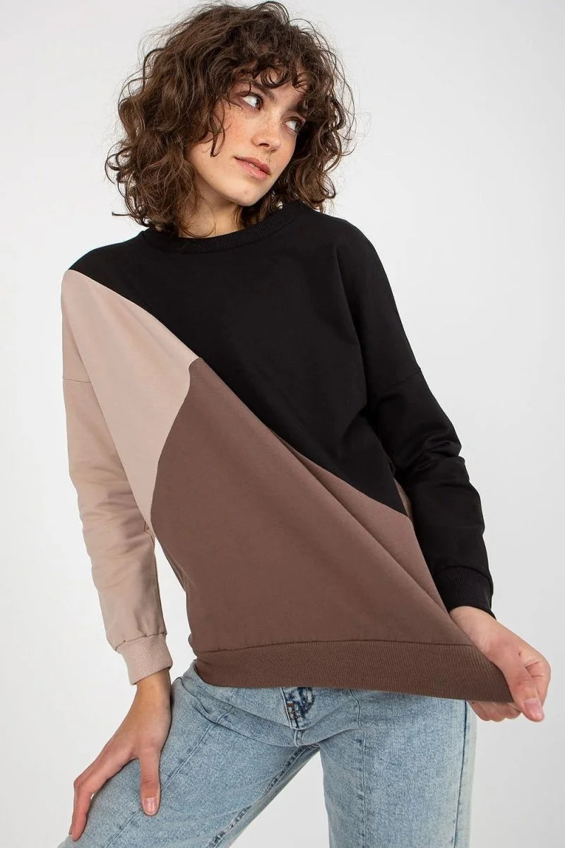 A women's colorblock long-sleeve sweatshirt in black, beige, and brown, with a crew neck.