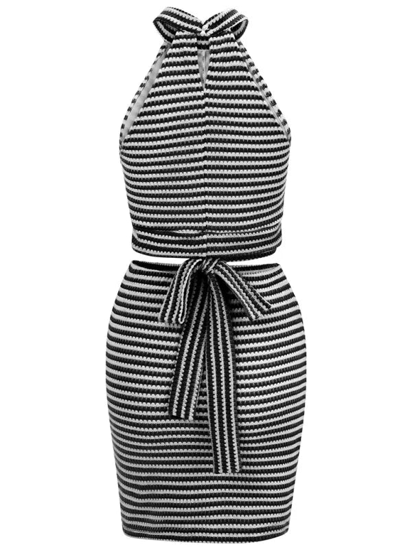 Black and white striped knit two-piece set with halter top and tie-waist skirt.