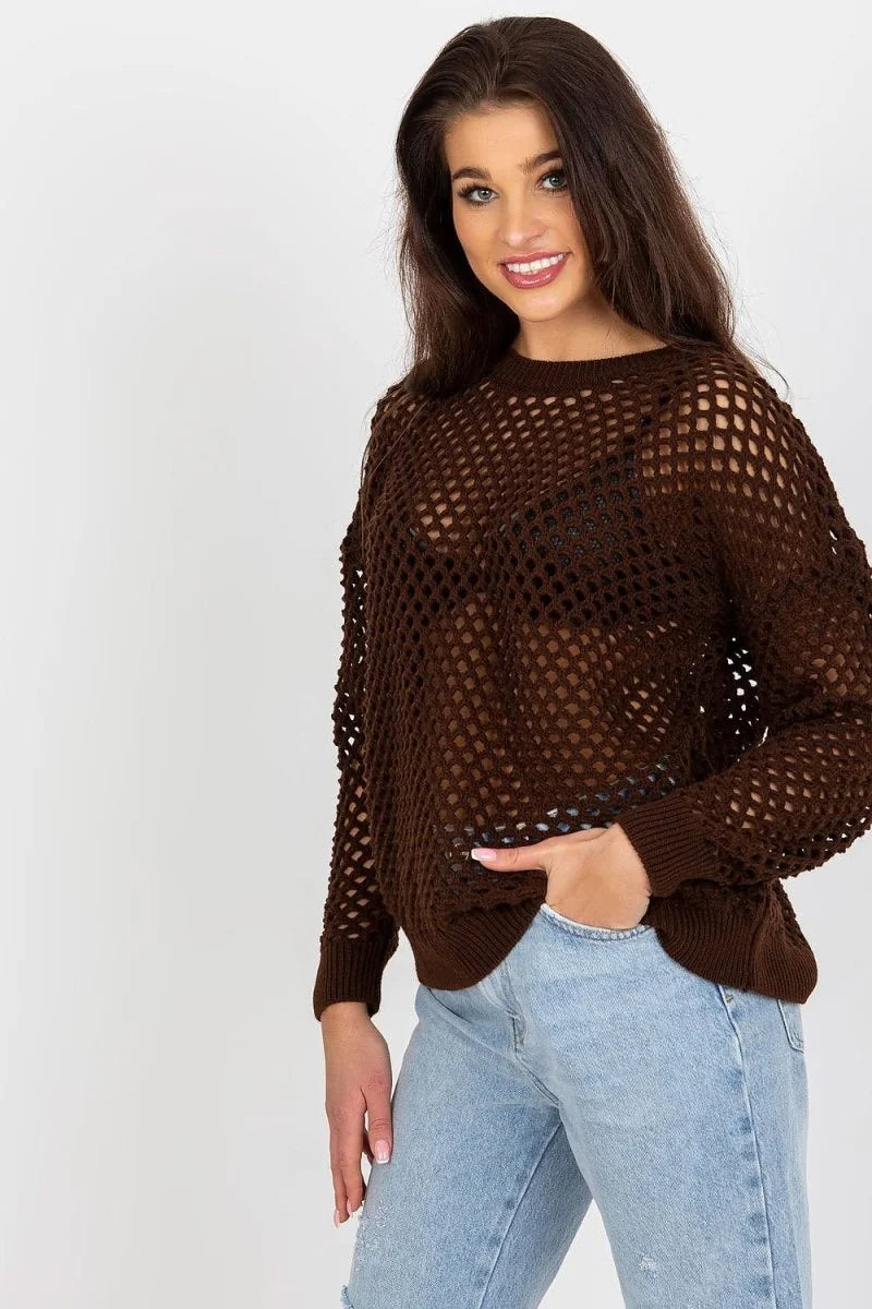 Brown fishnet knit sweater with a regular fit on a woman in light wash jeans.