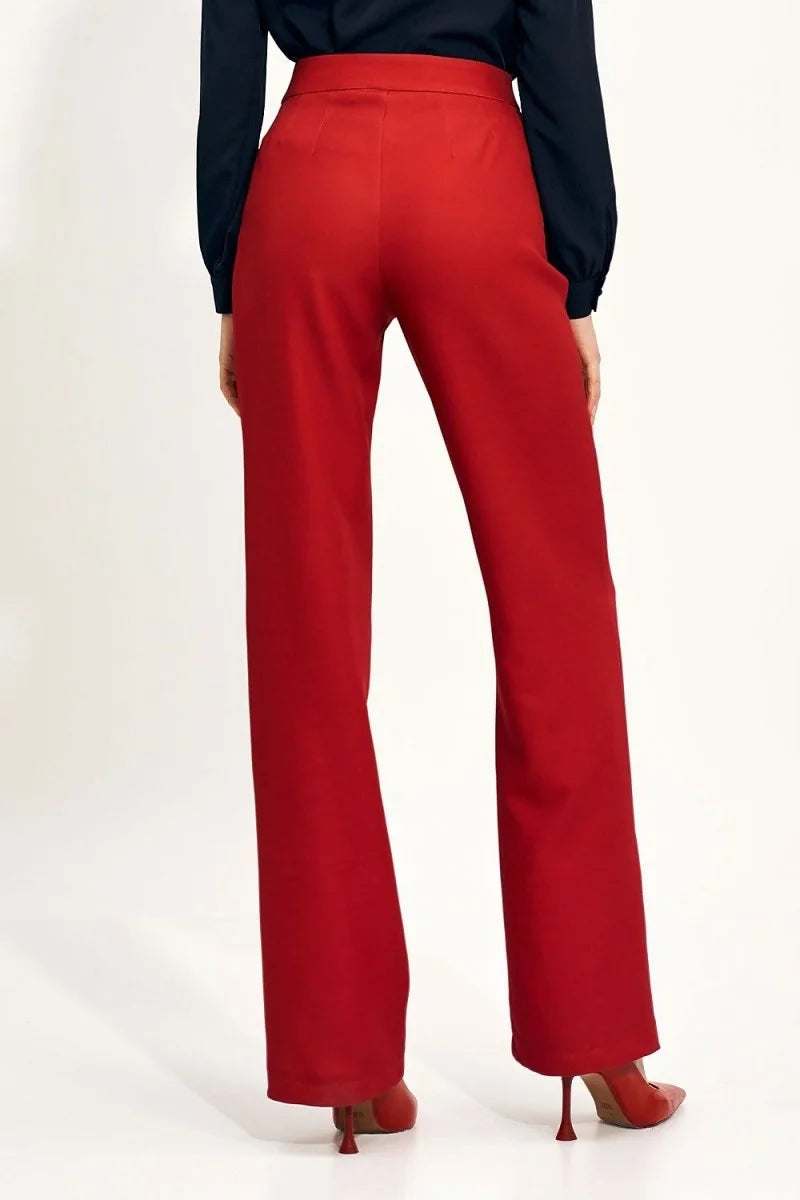 Back view of high-rise red wide-leg pants with a smooth texture.