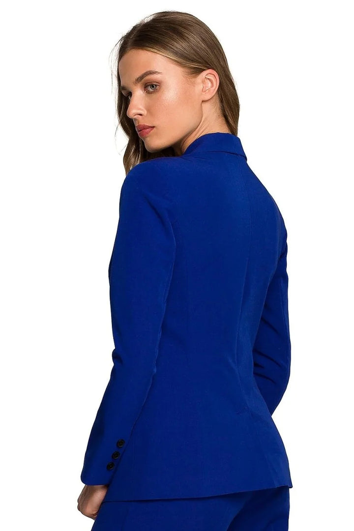 Back view of a royal blue blazer with three black buttons on the sleeve
