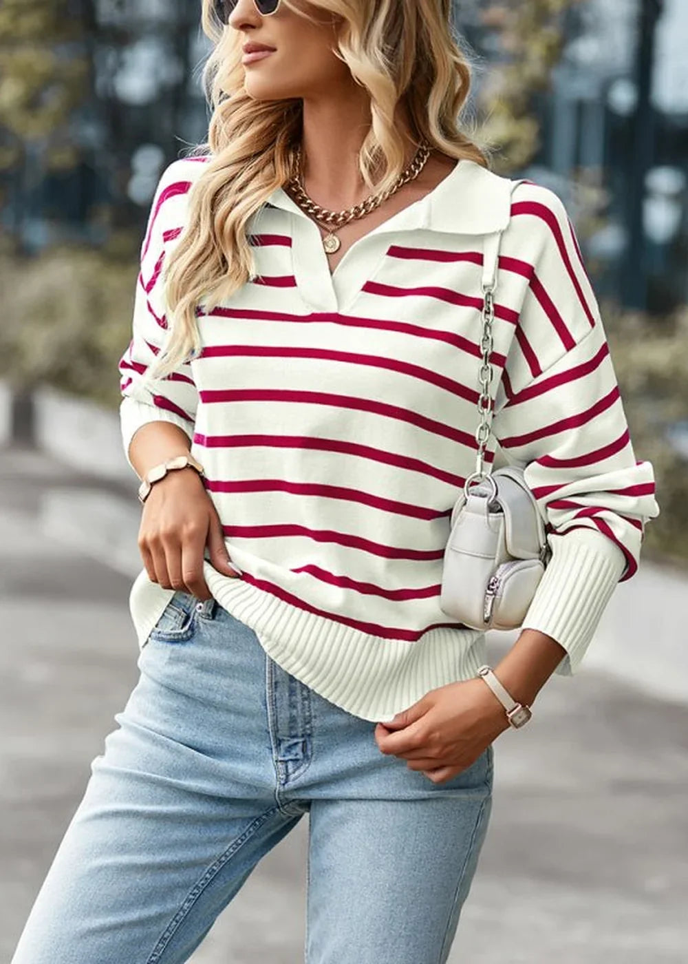 Cream and red striped relaxed fit sweater with a collar, worn by a model.