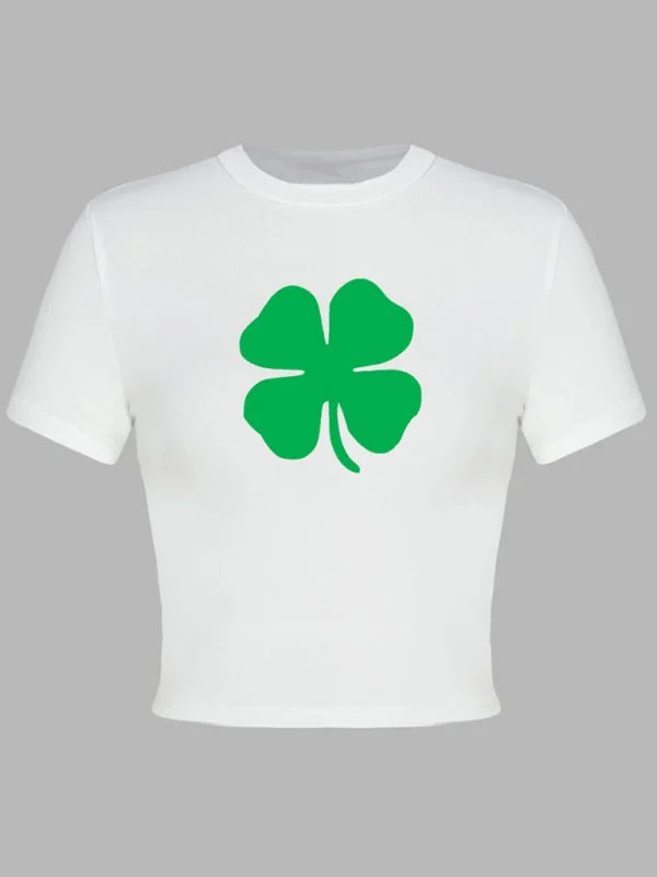 White crop top with a green four-leaf clover print.