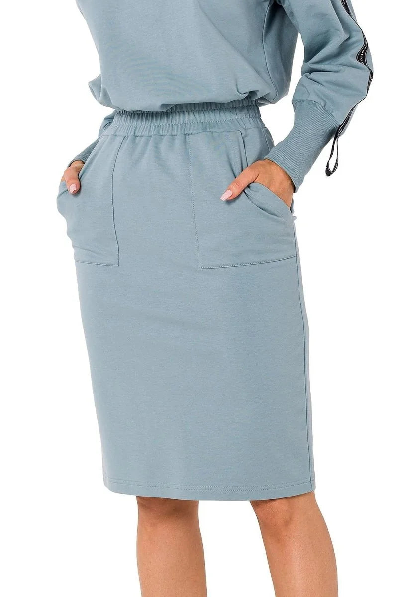 Dusty blue cotton-blend midi skirt with elastic waistband and functional pockets.