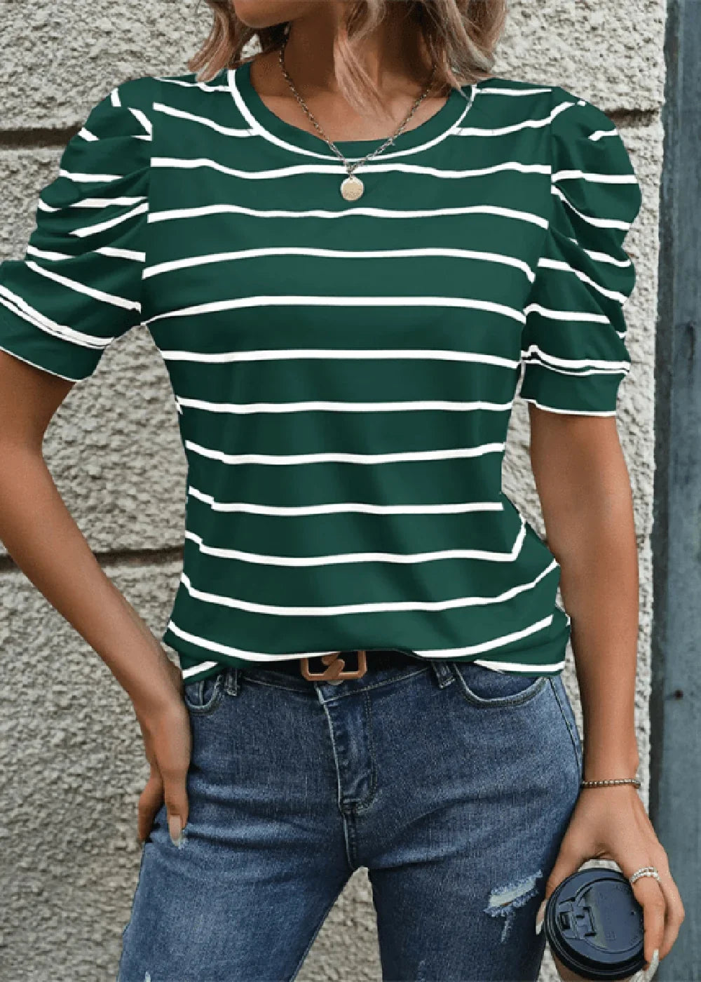 Green and white striped puff sleeve t-shirt on model.
