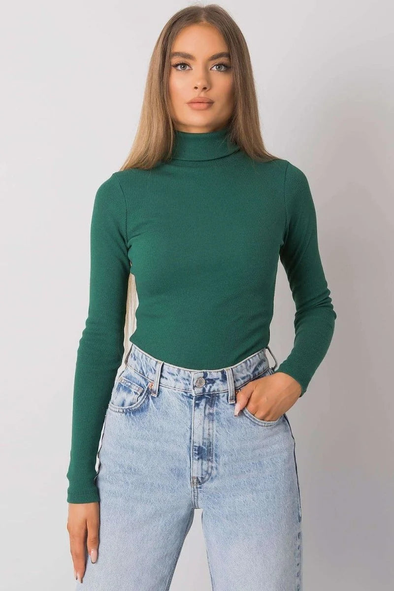 Fitted green ribbed turtleneck long-sleeve top on a model