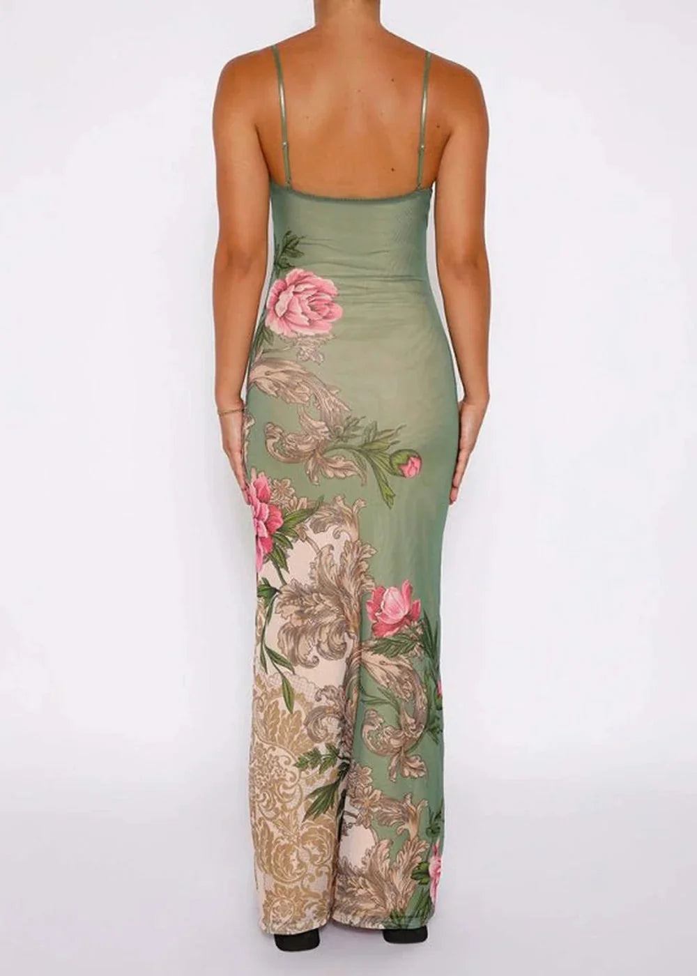 Green floral print maxi dress with sheer fabric and spaghetti straps, showing the back.