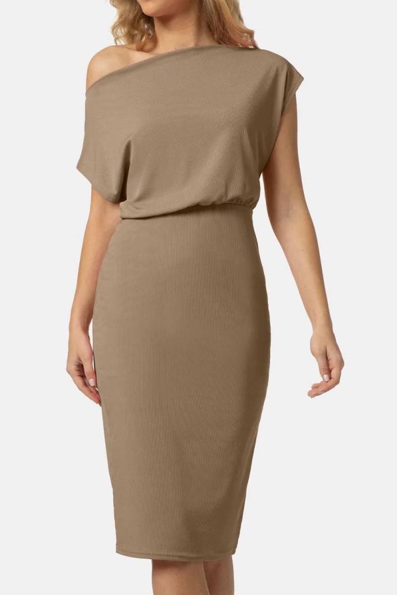 Tan ribbed midi dress with an off-the-shoulder neckline and a fitted waist on a model.