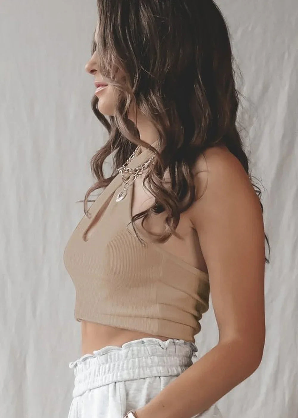 rayon-elastane showing true-to-size fit and fabric texture.
