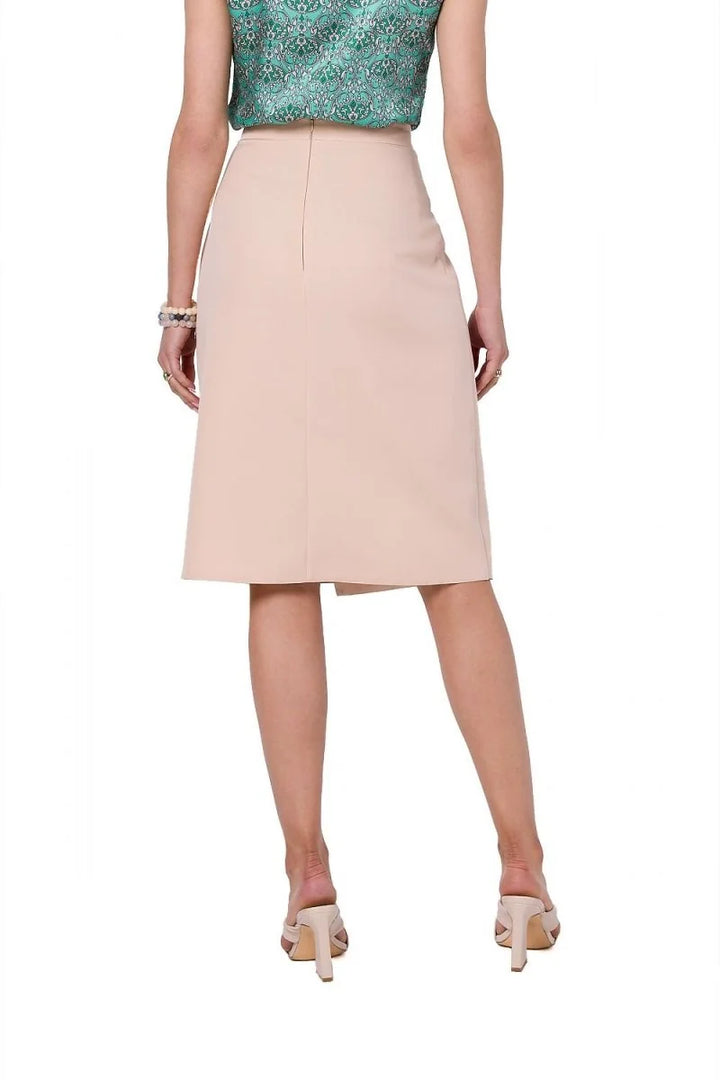 Nude pencil skirt with a smooth finish, shown from the back on a model.