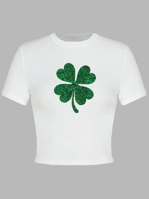 White cropped t-shirt with a sparkly green glitter four-leaf clover print.