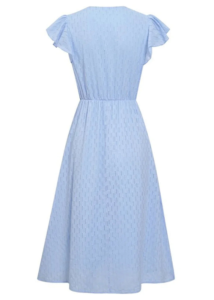 Light blue midi dress with a textured pattern, flutter sleeves, and empire waist.