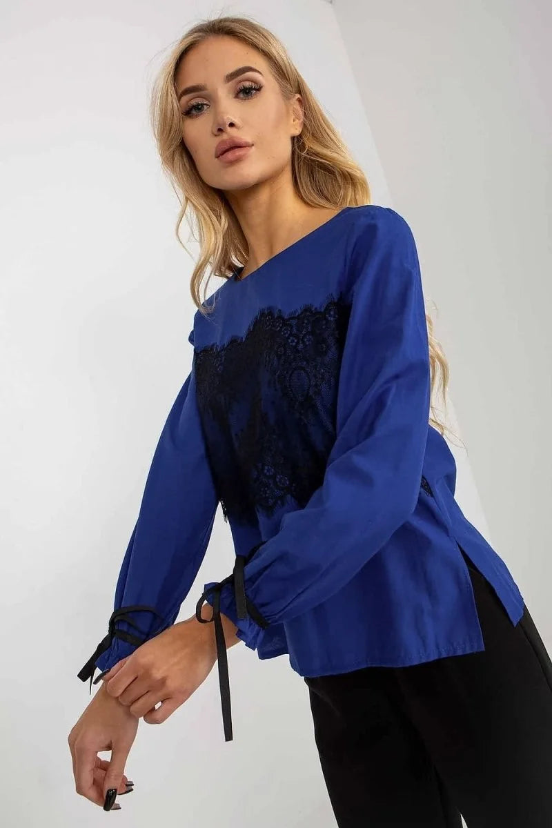 Royal blue long-sleeve top with black lace accent on the bodice and tie details on the cuffs.