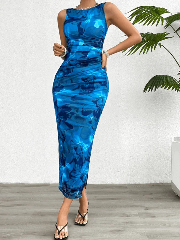 Sleeveless ruched blue tie-dye print maxi dress with a high neckline.