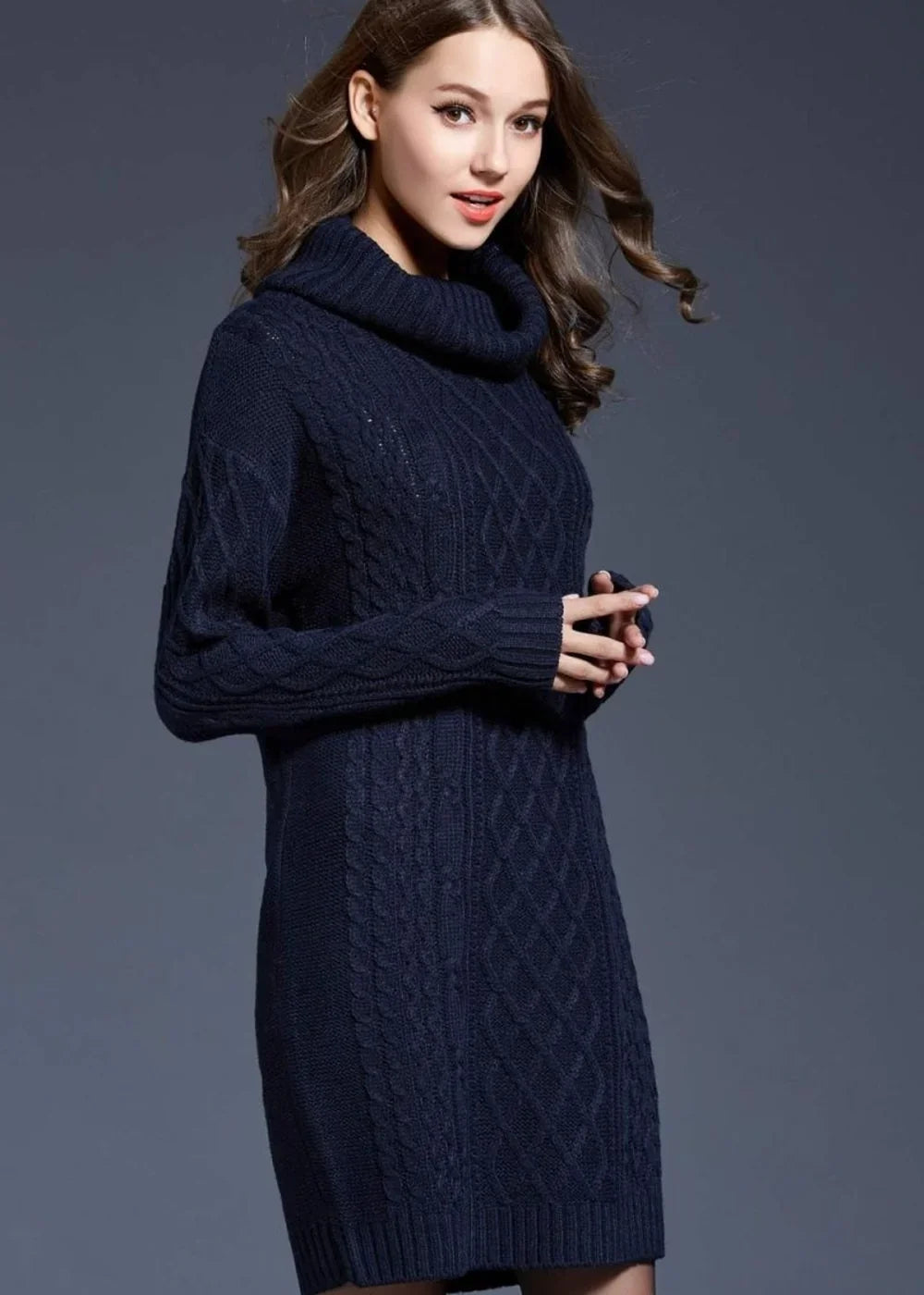 Navy blue cable knit turtleneck sweater dress on model