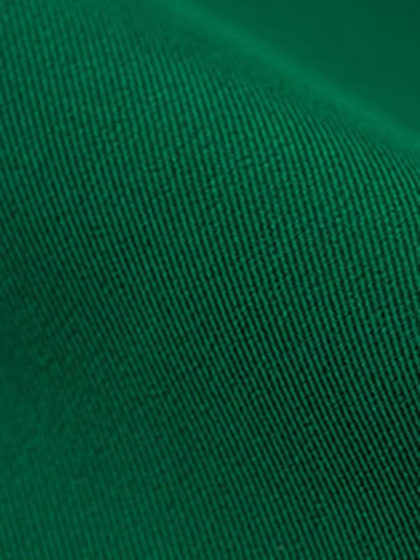 Close-up of a green textured polyester fabric with a diagonal ribbed pattern, draped to show its sheen.