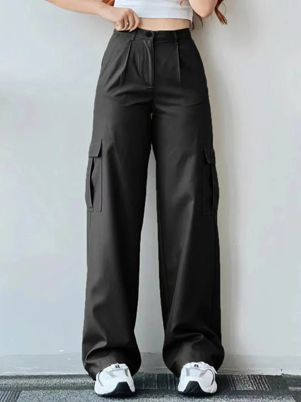 Black high-waisted cargo pants with a relaxed fit and pleated details, shown on model.