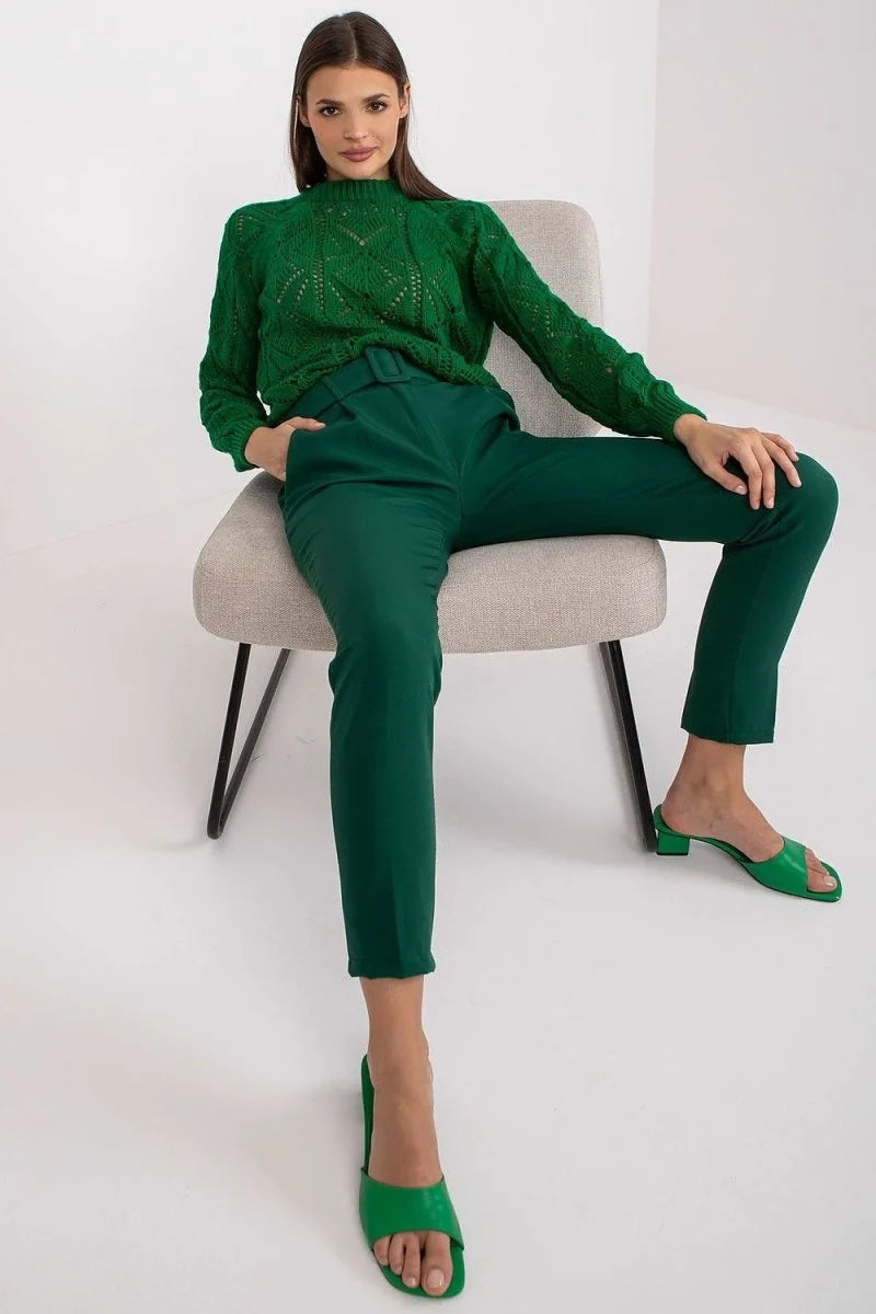 Green high-waisted pants with a matching belt, shown on a model.