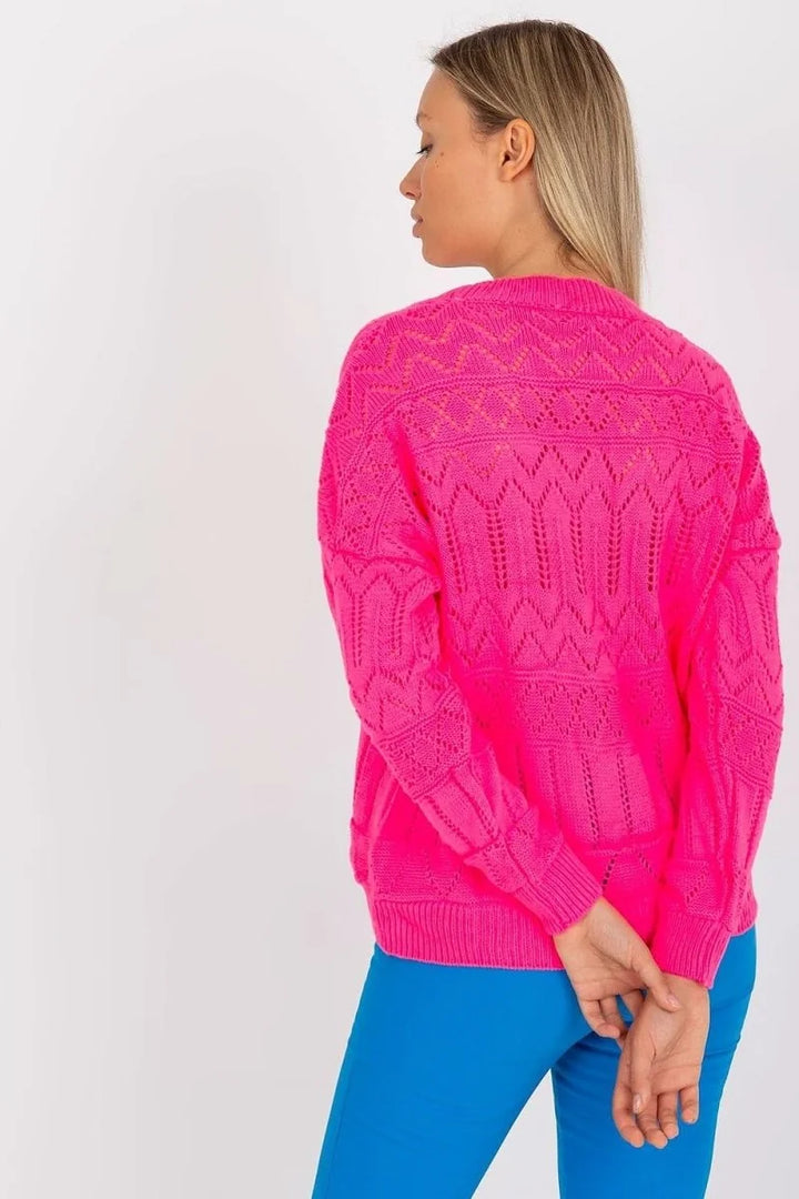 Hot pink knit sweater with intricate diamond and zigzag pattern, regular fit.