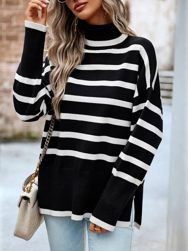 Black and white striped turtleneck sweater with a relaxed fit on a model.