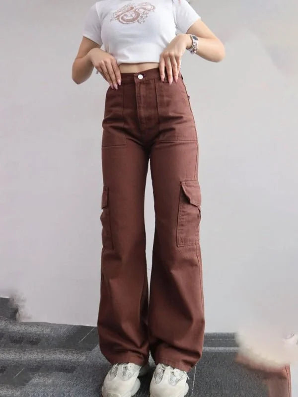 Relaxed fit brown cargo pants with a button closure and large side pockets, shown on a model.