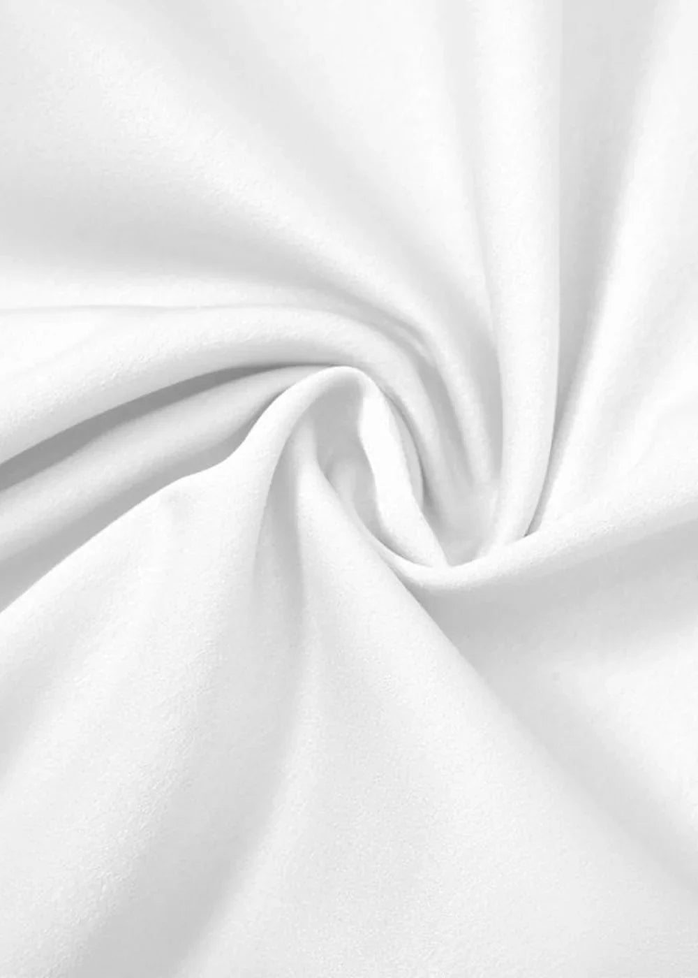 Close-up of white polyester fabric with soft folds and texture.