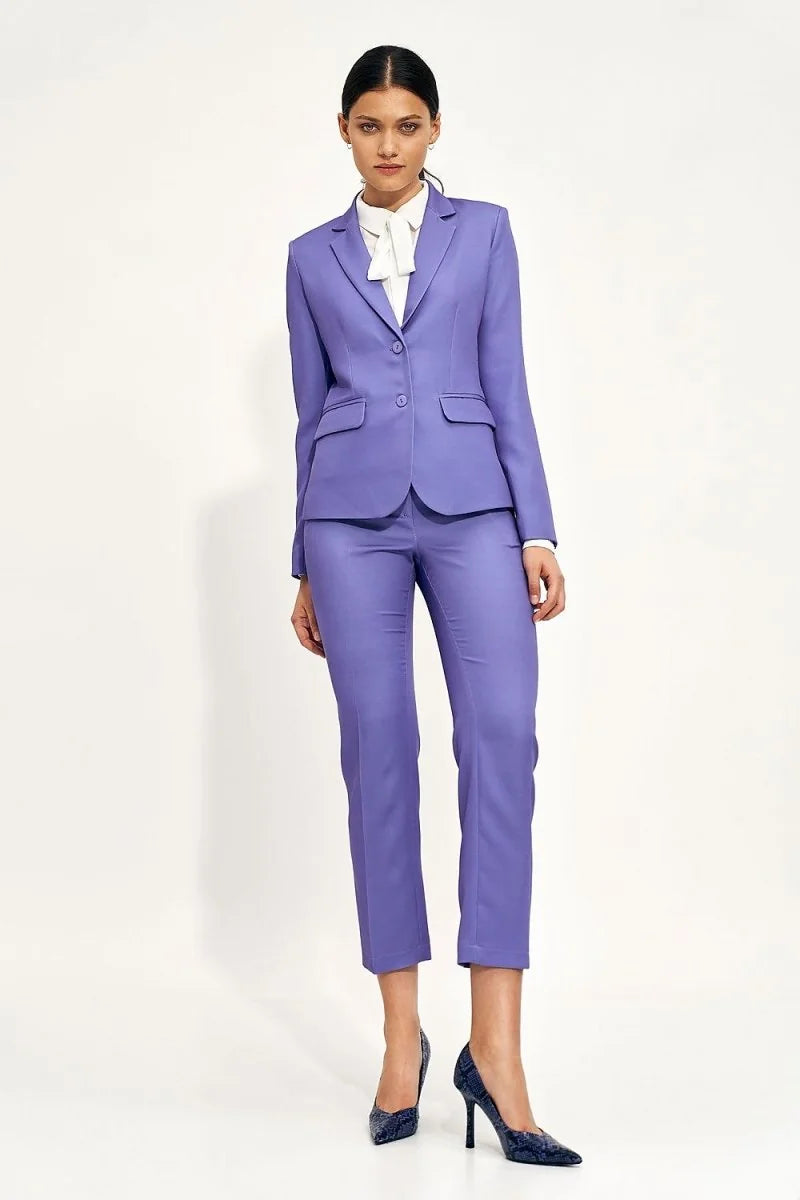 Lavender polyester pants with a regular fit, shown on a model with navy heels.