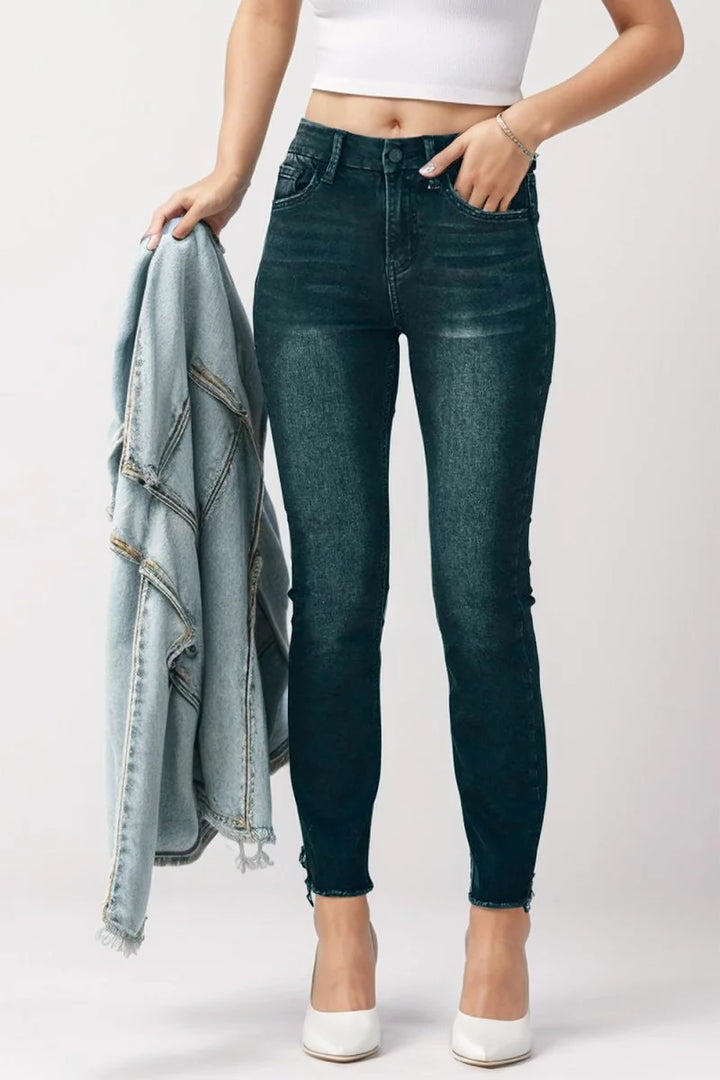 Black mid-rise skinny jeans with pockets