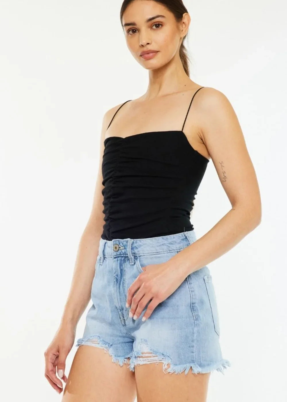 Light colored high waist frayed denim shorts