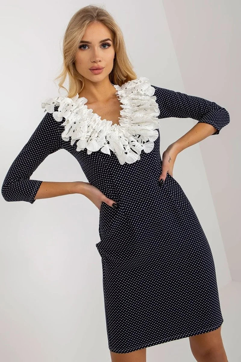 Navy blue pencil cut cocktail dress with 3/4 sleeves and lace detail