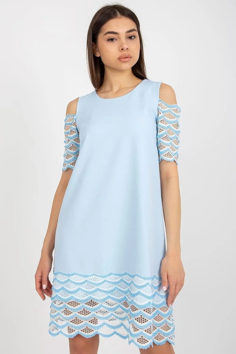 Light blue cocktail dress with open shoulders and intricate lace trim on sleeves and hem.
